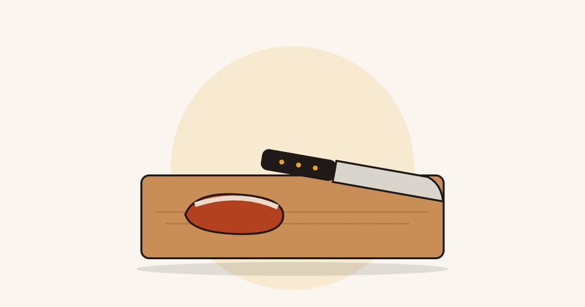 Melhor faca para churrasco: ilustração de uma faca ao lado de uma peça de carne na tábua